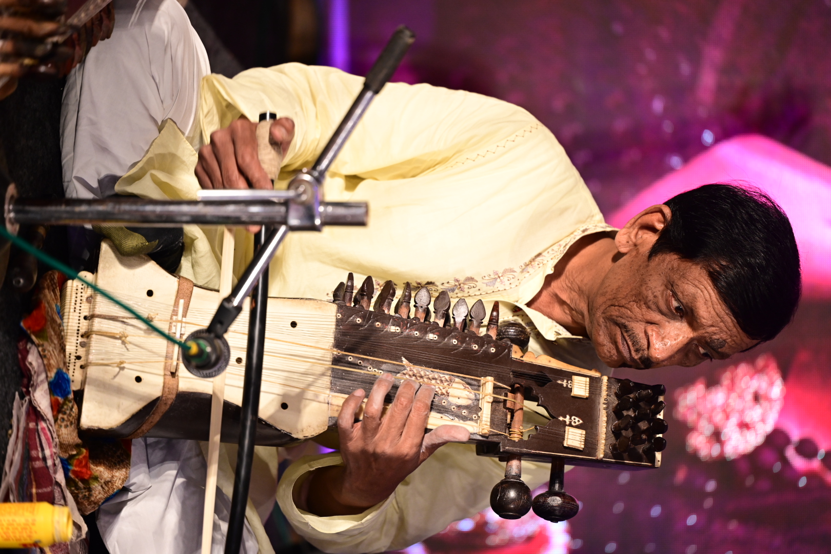 The sarangi player accompanying the band at Dil Hi To Hai