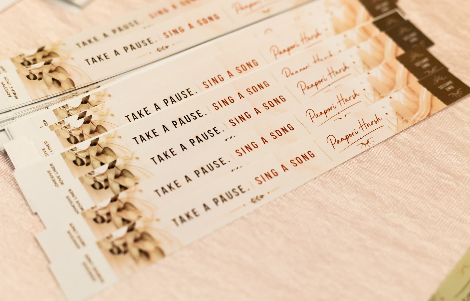 Take a pause. Sing a song — concert wristbands